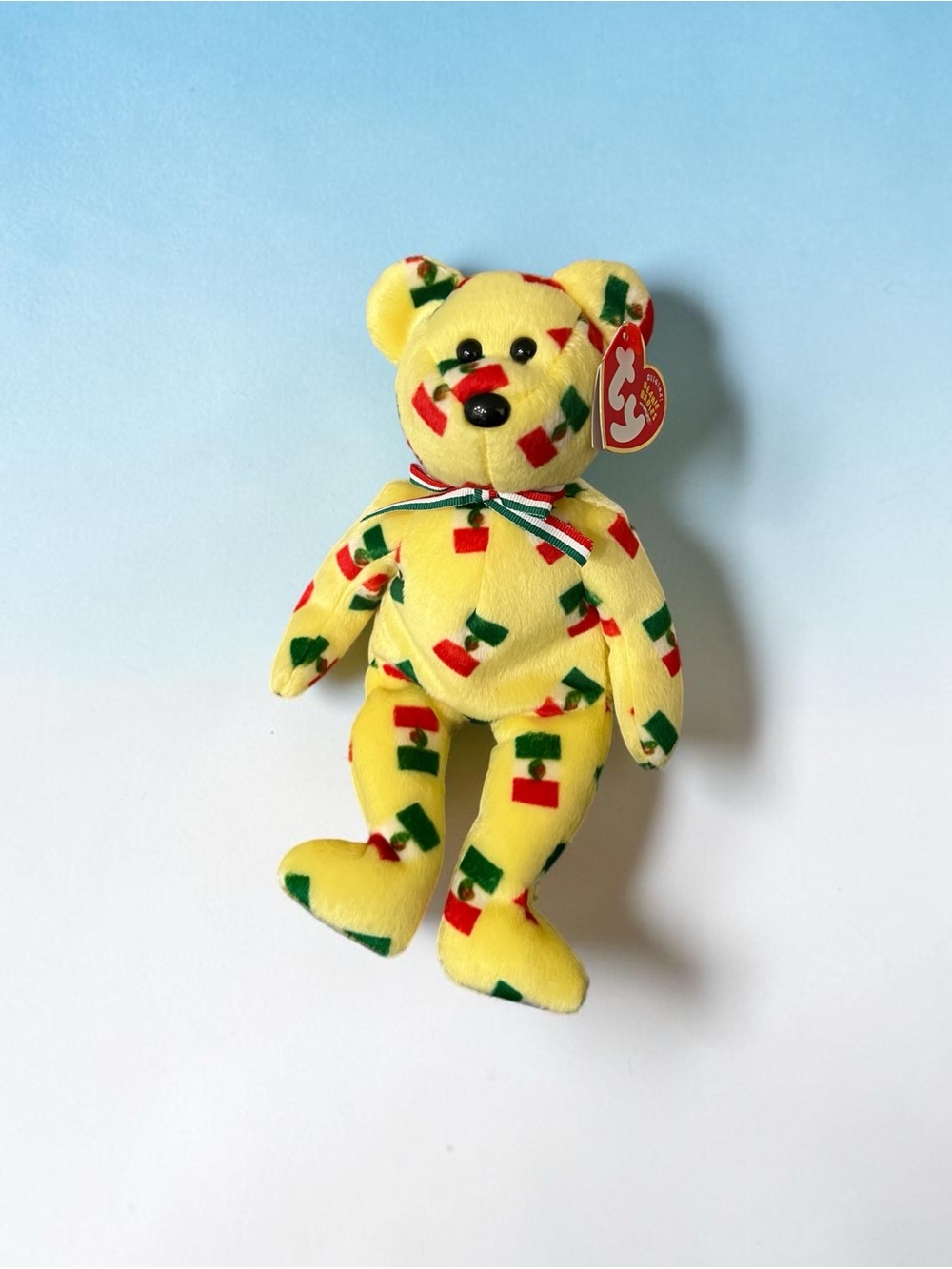 Ty “Piñata” Retired/Vintage Yellow Bear Plush with Mexican Flag Pattern. 2003
